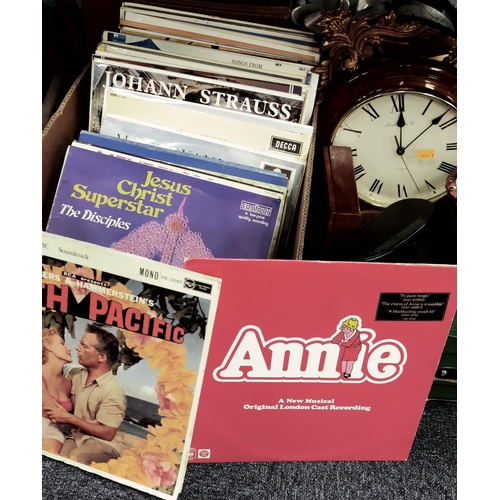 64 - Small quantity of LPs including Annie and South Pacific etc.; also an empty LP carrying case