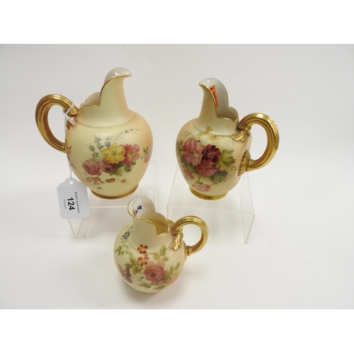 124 - Three Royal Worcester peach ground flat back jugs, all floral decorated and numbered 1094