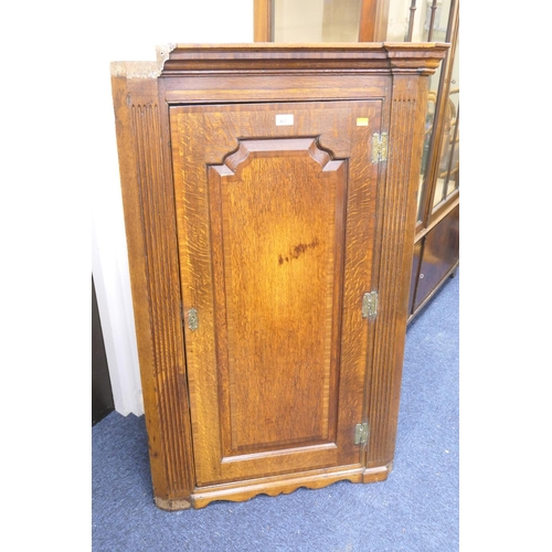 437 - Early 19th Century oak and walnut banded hanging flat front corner cupboard, height 117cm, width 75c... 