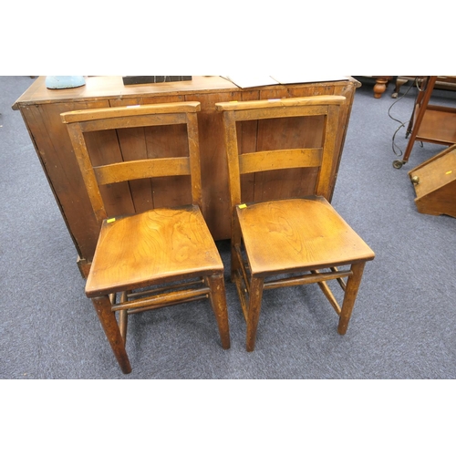 518 - Pair of Victorian beech and elm chapel chairs