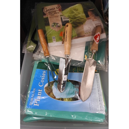 76 - Box of protective plant jackets; also three gardening tools