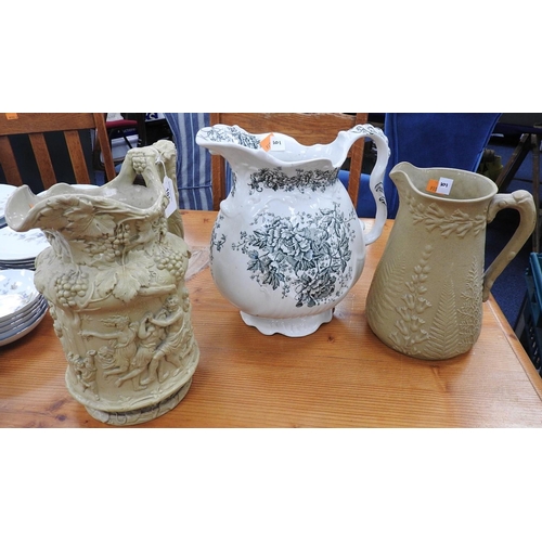 101 - Charles Meigh Bacchus stoneware jug (af) and two further Victorian jugs (3)