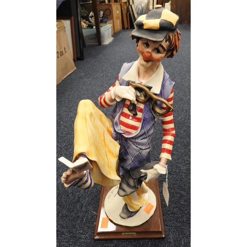 102 - G. Armani Capodimonte clown figure on wooden base