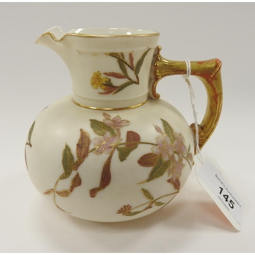 145 - Royal Worcester Ivory ground cream jug, printed with floral and gilt decoration