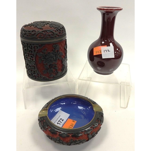 172 - Cinnabar lacquer red ground jar; also a matching ashtray and a Chinese Sang de boeuf small vase (3)