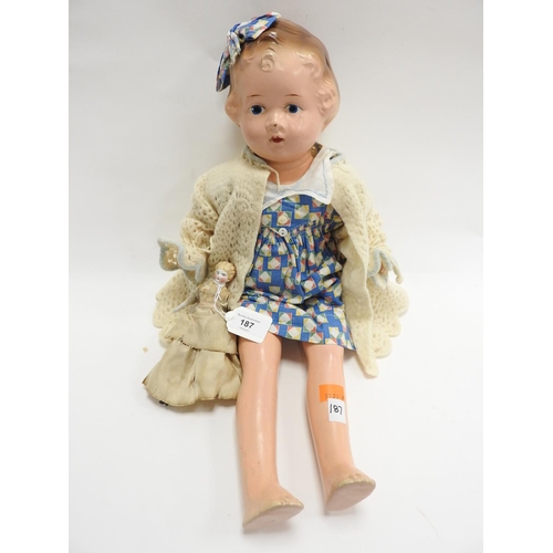 187 - Victorian ceramic and worn silk doll; also a 'Reliable' hard plastic and straw filled early 1960s do... 