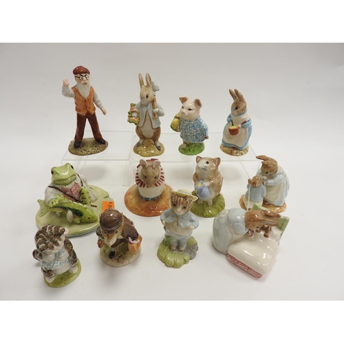 219 - Beswick Royal Doulton Beatrix Potter figures including 'Peter in Bed', 'Miss Moppet' and 'Jeremy Fis... 