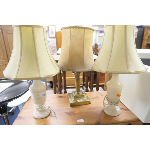 370 - Two alabaster table lamps and a brass Corinthian column table lamp (3)