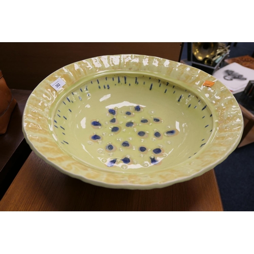 392 - Art pottery large yellow glazed bowl, 45cm diameter