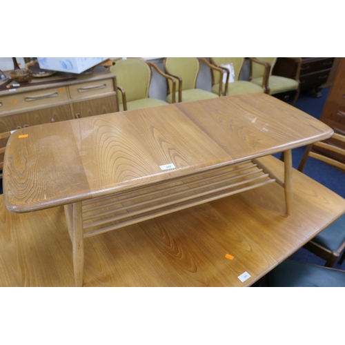 394 - Ercol elm coffee table with rack undershelf, width 103cm