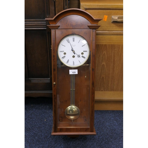 429 - Comitti, London, modern yewood finish musical chiming wall clock, height 68cm