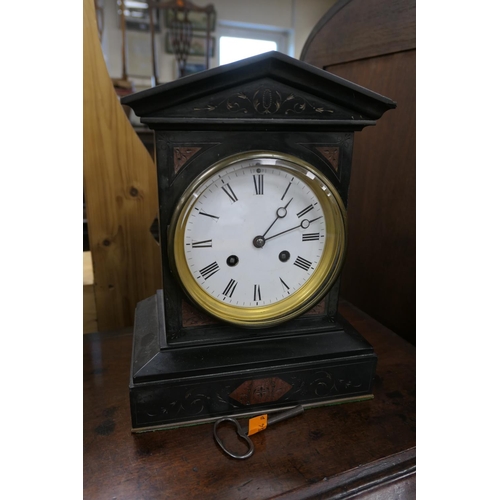 439 - Victorian polished slate chiming mantel clock, with key and pendulum, height 29cm