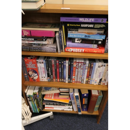 451 - Small open bookcase with assorted books and DVDs