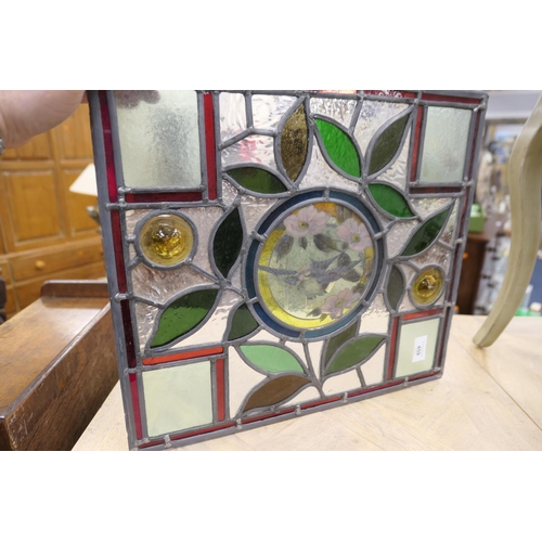 459 - Victorian Aesthetic period stained glass window panel centred with a flying sparrow, 39.5cm x 44cm