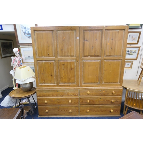 472 - Victorian pitch pine housekeeper's cupboard, fitted with four folding double panel doors, opening to... 