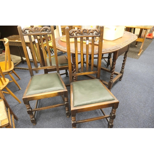 477 - Victorian carved oak barleytwist gateleg table and four non-matching oak slat back dining chairs, ta... 