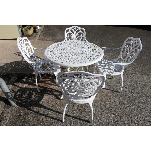 494 - White painted alloy metal patio set comprising a circular table and four armchairs (5)