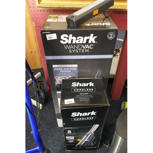 506 - Shark cordless vacuum cleaner, in original packaging, also a Shark cordless hand held vacuum in orig... 