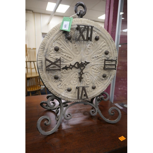 520 - Unusual wrought metal and composite table clock, height 53cm