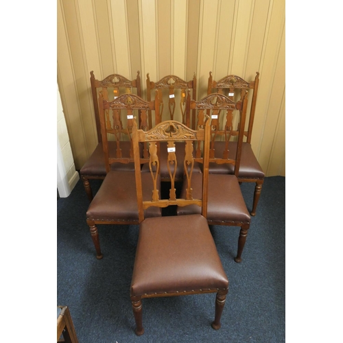 548 - Set of six late Victorian carved walnut dining chairs with brown leatherette seats