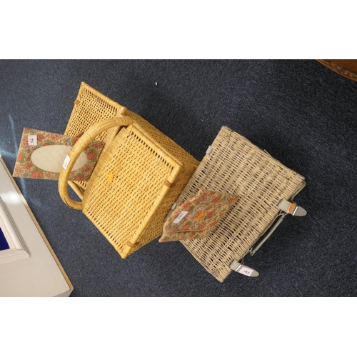 561 - Wicker picnic basket, another wicker basket and two fabric photograph frames (4)