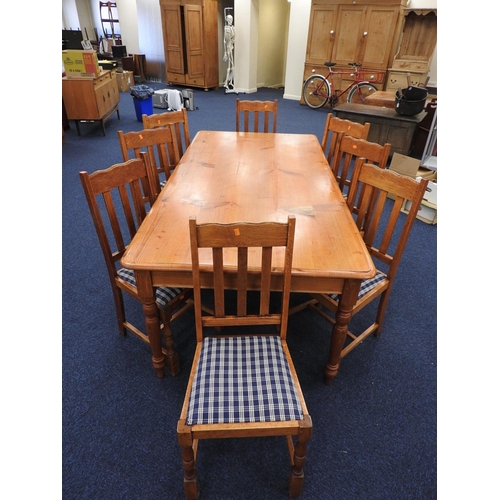 563 - Pine dining table in Victorian style, 209cm x 103cm, together with eight oak slat back dining chairs... 