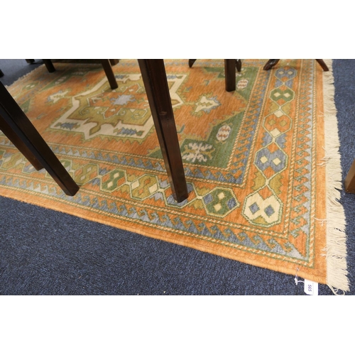 565 - Indian made woollen rug, Persian in style, 186cm x 141cm