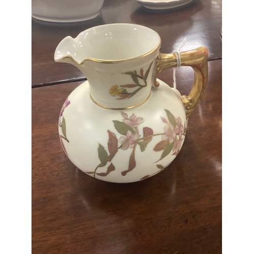 145 - Royal Worcester Ivory ground cream jug, printed with floral and gilt decoration