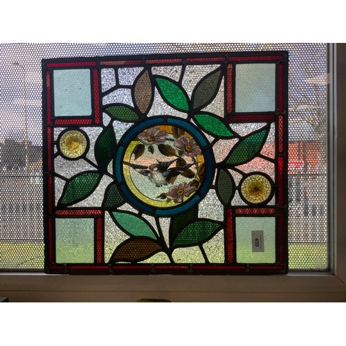 459 - Victorian Aesthetic period stained glass window panel centred with a flying sparrow, 39.5cm x 44cm