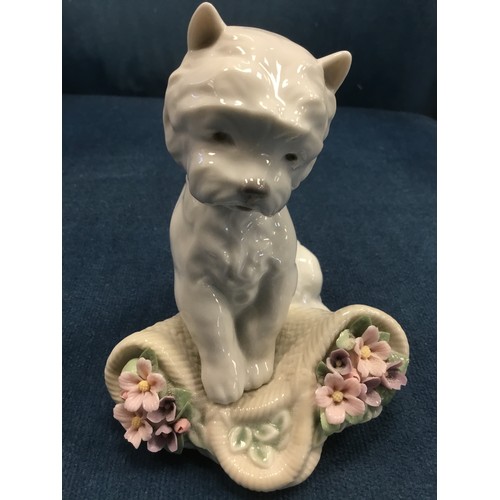 116 - Four Lladro canine figurines