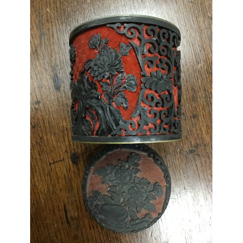 172 - Cinnabar lacquer red ground jar; also a matching ashtray and a Chinese Sang de boeuf small vase (3)