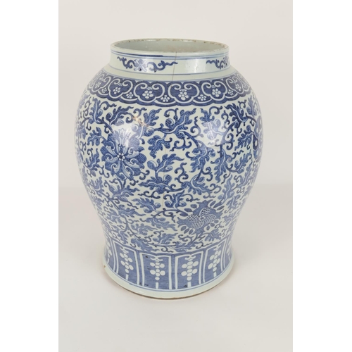 131 - Chinese large blue and white jar, in Ming style, 19th Century, decorated with stylised flowers and s... 