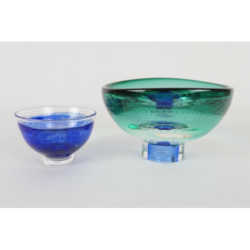 138 - Kosta Boda small glass footed bowl, designed by Goran Warff, tinted green with evenly spaced air bub... 