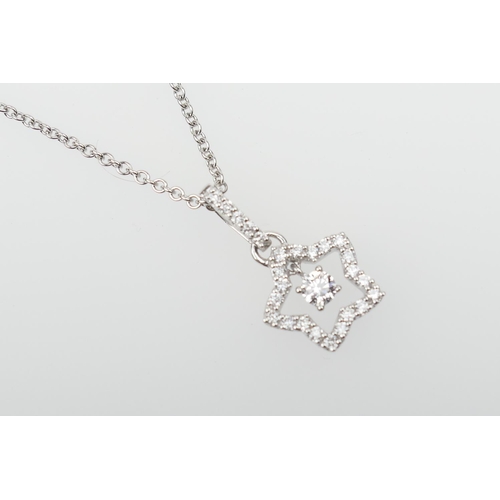 347 - 18ct white gold and diamond pendant necklace, the pendant of star shape centred with a round brillia... 