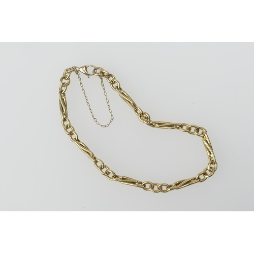 406 - 18ct gold chain and double bar link bracelet, with lobster claw clasp and safety chain, length 20cm,... 