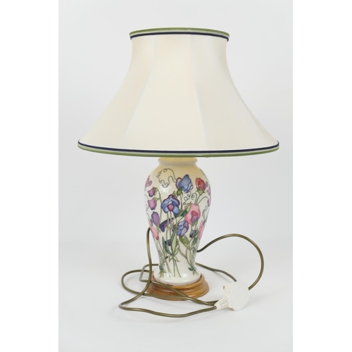 61 - Moorcroft 'Sweet Pea' white ground pottery table lamp, cream fabric shade, total height with shade 5... 