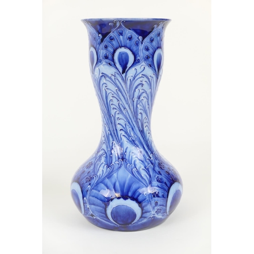 64 - William Moorcroft for Macintyre, a Florian ware Peacock vase, circa 1900, finished in shades of blue... 