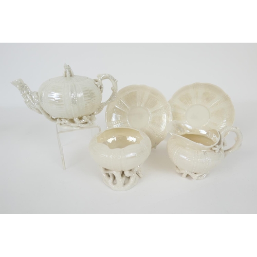 72 - Belleek First Period Sea Urchin part tea service comprising lidded teapot with instructions on the i... 