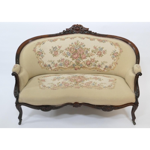 775 - Victorian carved mahogany and upholstered canape, circa 1860,  with acanthus and foliate carved cres... 