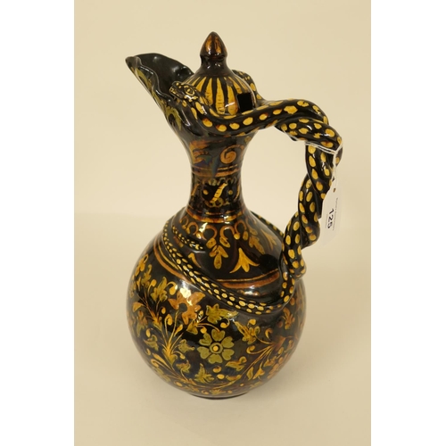 125 - India, Bombay School of Art, slip decorated pottery ewer, circa 1900, baluster form with entwined se... 