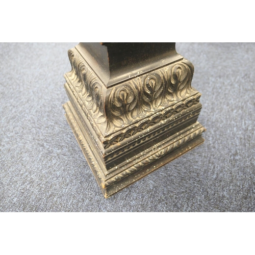 771 - Continental carved ebonised torchere, square plinth on an acanthus vine carved, tapered, square sect... 