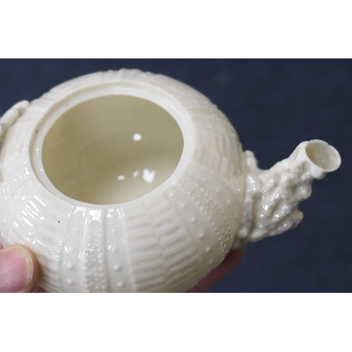 72 - Belleek First Period Sea Urchin part tea service comprising lidded teapot with instructions on the i... 