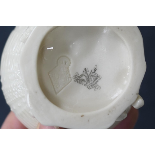 72 - Belleek First Period Sea Urchin part tea service comprising lidded teapot with instructions on the i... 