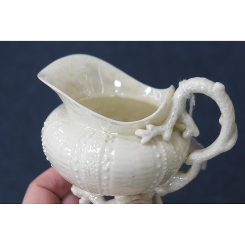 72 - Belleek First Period Sea Urchin part tea service comprising lidded teapot with instructions on the i... 