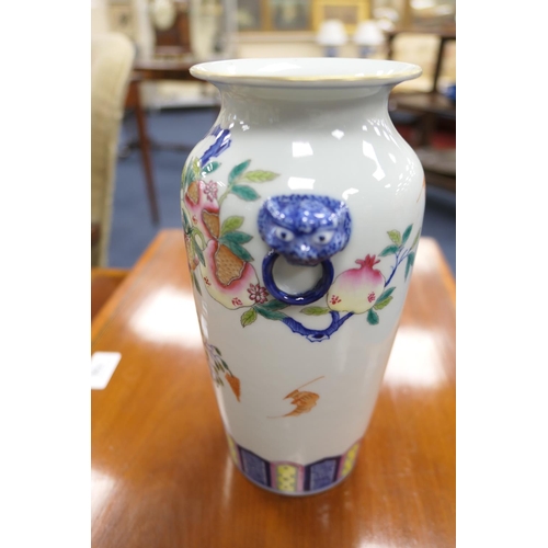 87 - Chinese famille rose vase, shouldered form with mask and ring handles and decorated with pomegranate... 