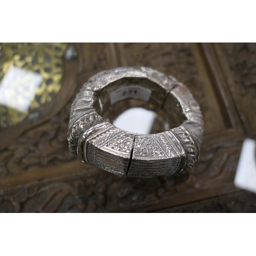 231 - Middle Eastern silver coin belt, supporting seven silver thalers, fronted with a 9cm engraved disc; ... 