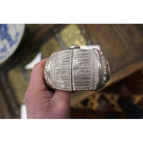 231 - Middle Eastern silver coin belt, supporting seven silver thalers, fronted with a 9cm engraved disc; ... 