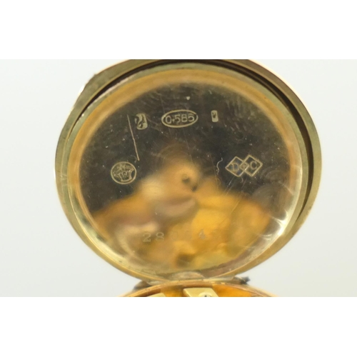 370 - Continental 14ct gold lady's fob watch, circa 1900-10, engine turned case, white dial with Arabic nu... 