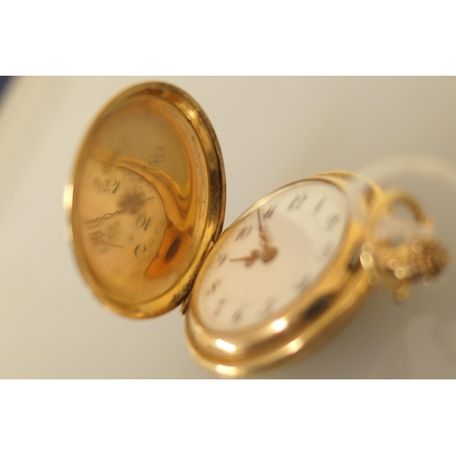 370 - Continental 14ct gold lady's fob watch, circa 1900-10, engine turned case, white dial with Arabic nu... 