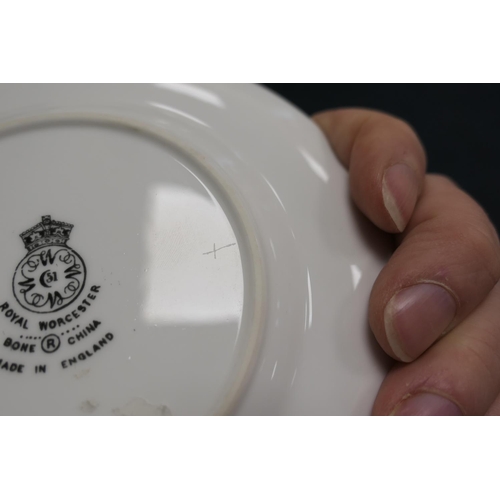 90 - Pair of Royal Worcester saucers, decorated by Harry Stinton with highland cattle within a gilt edged... 